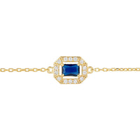 Gold gemstone bracelet with blue sapphire square setting and halo detail