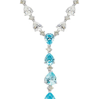 Silver statement necklace with blue topaz teardrop accents and clear rhinestone links