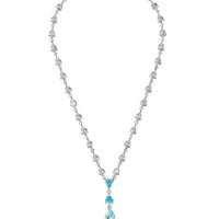 Silver necklace with blue topaz drops and a continuous row of clear crystal stones
