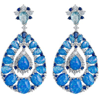 Silver drop earrings with blue teardrop gemstones and clustered opal-like accents