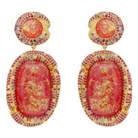 Gold drop earrings with pink opal stones and pavé accents