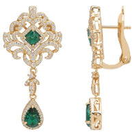 Gold drop earrings with emerald stones and clear pavΓ© accents