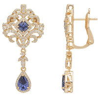 Gold drop earrings, front and back view, with blue teardrop gemstone and pave