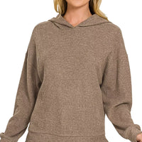 Brown ribbed hoodie with hood, long sleeves, and front kangaroo pocket