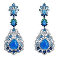 Blue opal drop earrings with silver-tone settings and teardrop blue stones
