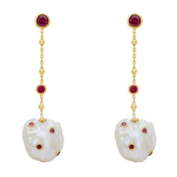 Gold-tone drop earrings with pearl chain, red ruby beads, and white baroque pearl charm