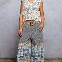 Off-white crocheted cropped button-down vest with intricate openwork panel and scalloped trim