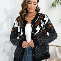 Black ghost-pattern cardigan with button front, long sleeves, and open V-neck