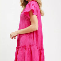 Fuchsia textured mini dress with side-sleeve ruffles and gathered waist skirt