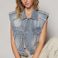 Light wash denim sleeveless vest with pointed collar and asymmetrical button front