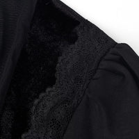 Black lace-trim panel detail on velvet corset-style blouse with sheer sleeve fabric