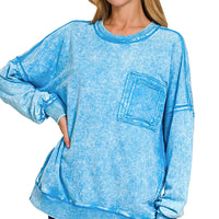 Deep sky blue acid-wash sweatshirt with front pocket and raw-edge cuffs