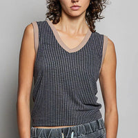 Ribbed V-neck sleeveless tank in dark charcoal with contrast collar trim