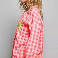Pink gingham embroidered blouse, side view with palm tree front detail