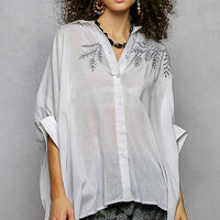 Ivory embroidered floral button-front high-low shirt with relaxed wide sleeves