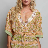 Coral floral tie-front boho blouse with V-neck and three-quarter loose sleeves