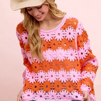 Orange and pink floral crochet knit top with long sleeves, scoop neckline and scalloped hem.