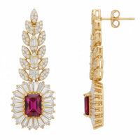 Gold-tone ruby-red gemstone drop earrings with crystal detailing, side view