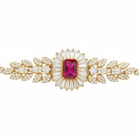 Gold bracelet with oval ruby center stone and leaf-shaped crystal links