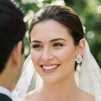 Pearl baroque flower drop earrings worn by bride