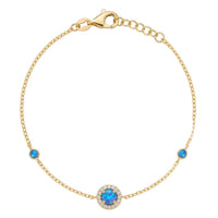 Gold-tone round blue opal bracelet with blue bezel stones and CZ center