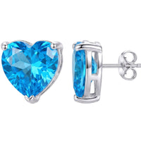 Heart blue topaz stud earrings in silver with visible clasp backing