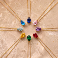 Gold chain teardrop necklaces with assorted colored gemstone pendants