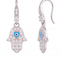 Silver-tone hamsa hand drop earrings with blue eye enamel and clear stone sparkle.