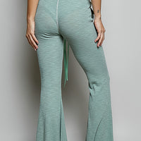 Pale sage ribbed knit drawstring flare pants with back patch pocket