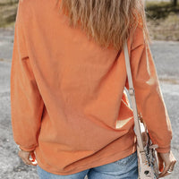 Orange sherbet tunic sweatshirt back view, ribbed crew neck and long sleeves