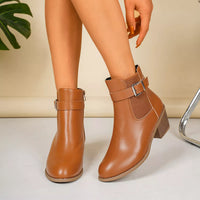 Tan/brown point-toe block heel ankle boots with front buckle strap