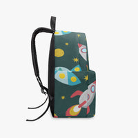 Dark green canvas space-themed backpack with rocket, planet, and star prints; drawstring cord.