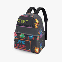 Kids canvas backpack in black with pixel “START” window and colorful game icons.