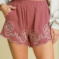 Dusty pink embroidered linen-blend shorts with elastic waistband and scalloped hem