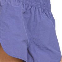 Light blue windbreaker running shorts with gathered elastic waistband, back view