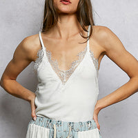 Women's off-white lace-trim V-neck cami with spaghetti straps, front view