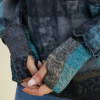 Dark gray plaid fleece hoodie with dropped shoulders and contrast knit cuffs