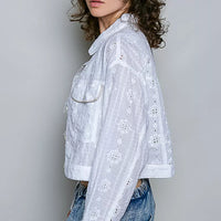 Off white eyelet cropped button-front jacket, long sleeves with flap chest pockets