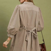 Brown striped contrast belted mini dress from the back, bow tie waist and striped hem