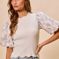 White knit sweater top with puff floral contrast sleeves and scalloped hem