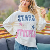 Cream sweatshirt with blue 'STARS' patch print and red stripe detail