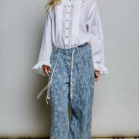 Ivory lace-trim button-down shirt with ruffled neckline and pintuck front