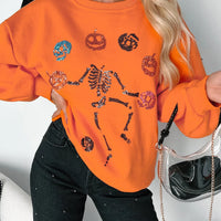 Orange Halloween sweatshirt front with skeleton and pumpkin graphic