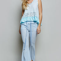 Powder blue floral print sleeveless tank with ruffled hem and keyhole back detail