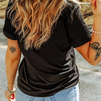 Black short-sleeve T-shirt back view, rhinestone ghost graphic on front