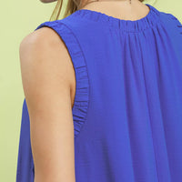 Sapphire blue sleeveless dress back detail with gathered yoke and pleats