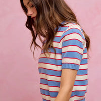 Striped knit crew neck short-sleeve sweater top, side view with red/white stripes on blue