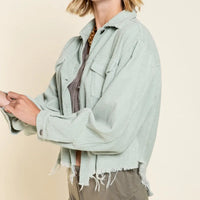 Sage corduroy button-front trucker jacket with flap chest pockets, frayed cuffs and hem