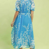 Blue floral tie-waist midi dress, back view with gathered ruffled sleeves