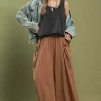 Brown flowy wide-leg pocket pants with gathered waist and pleated front